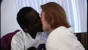 White skinned red-head likes to take humongous ebony wang in her mouth